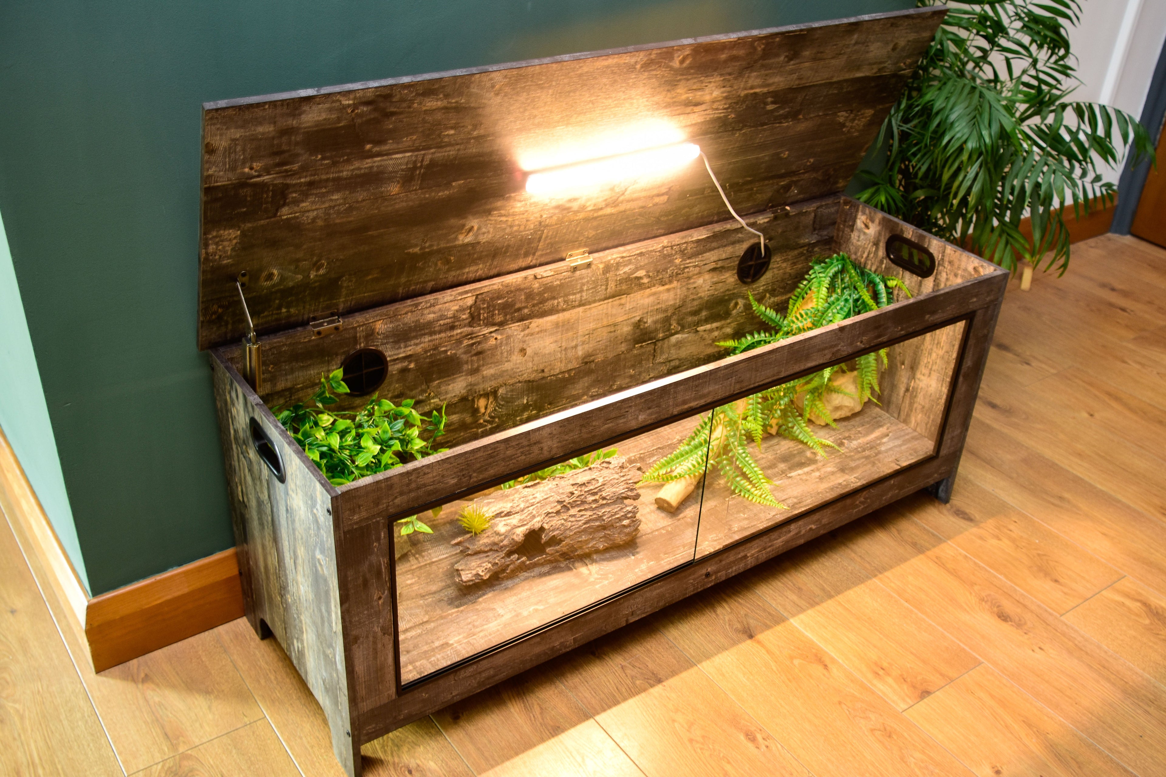Distressed wood 4ft vivarium tortoise enclosure with plants and LED lighting, front view