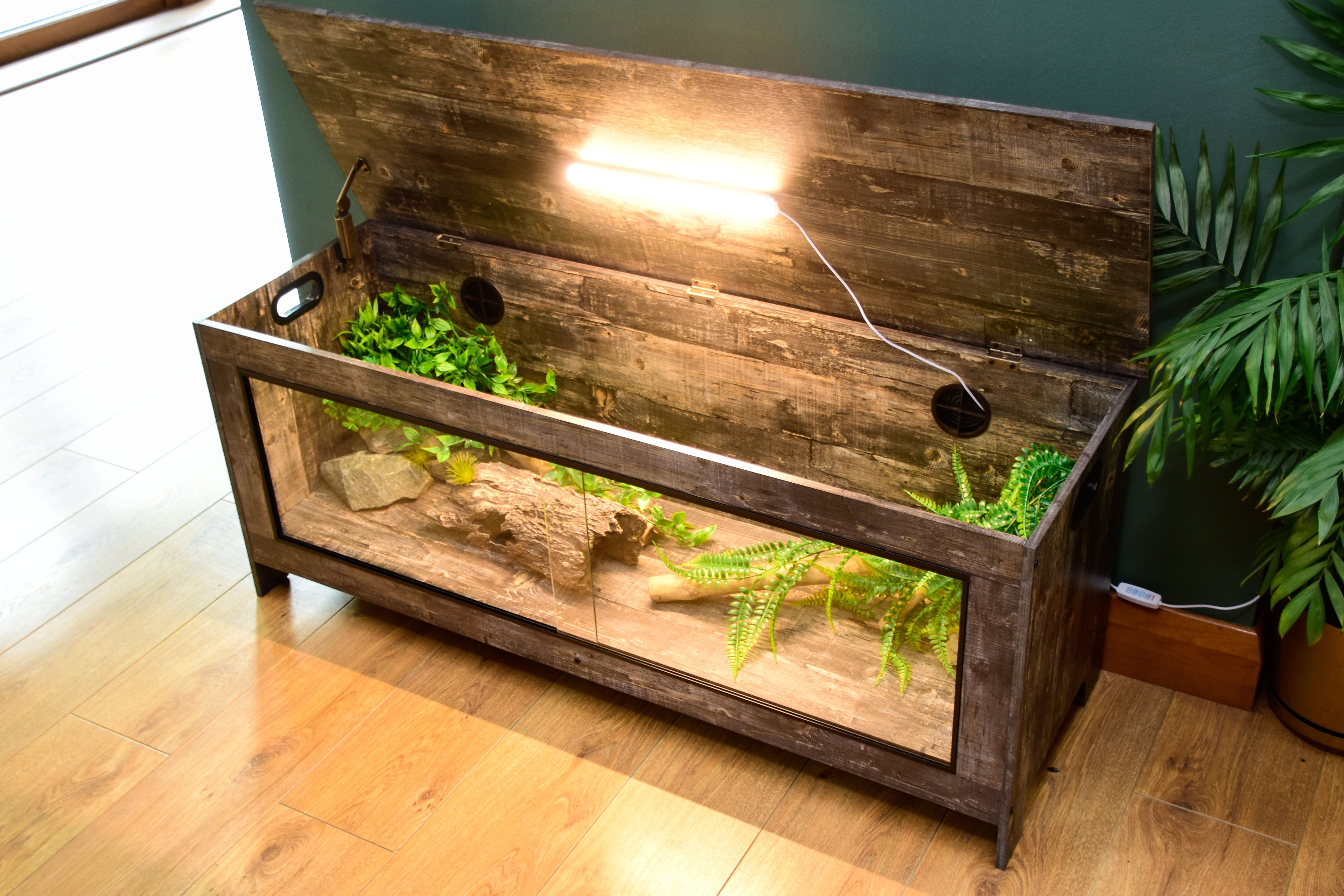 Distressed wood tortoise enclosure front view with sliding glass doors