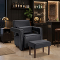 Black leather accent chair with footstool in home bar setting