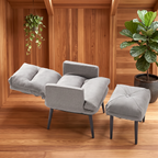 Grey recliner armchair shown in fully reclined position with footstool