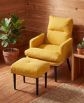Yellow recliner armchair and footstool on wooden floor with plants